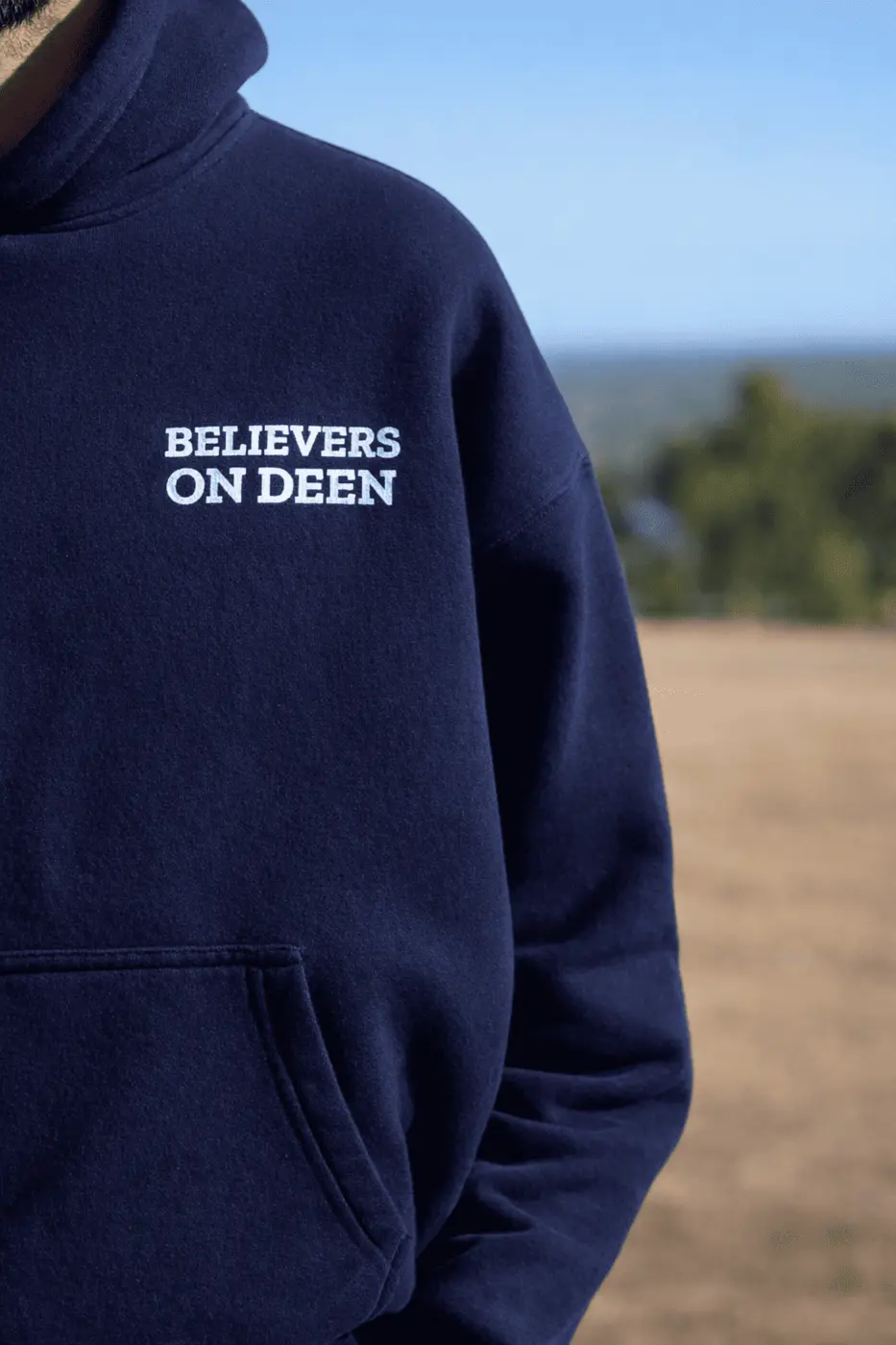 United Ummah Hoodie in navy — the crest